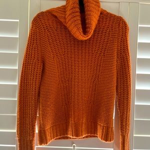 French girl chic chunky-knit orange sweater
